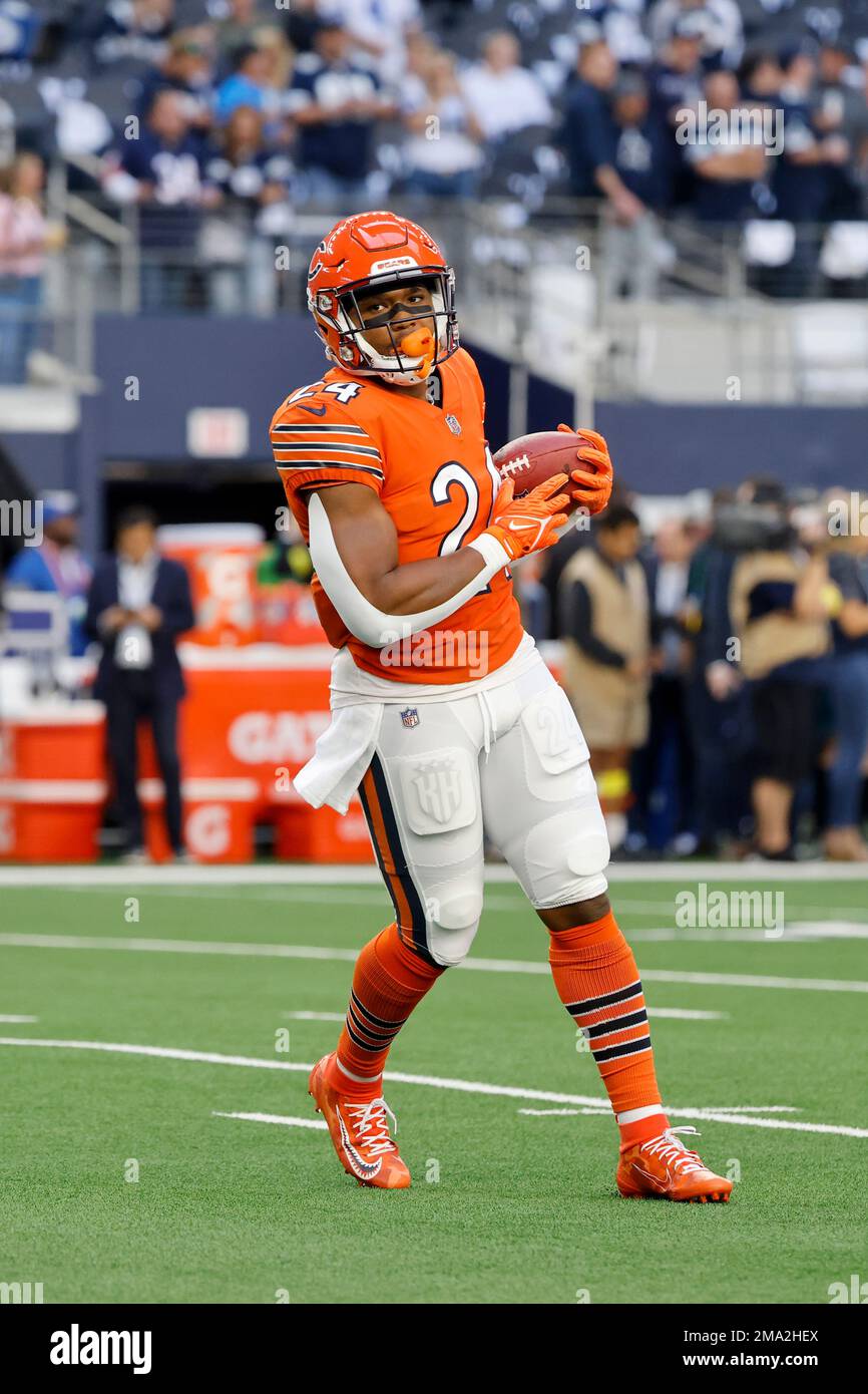 Chicago Bears running back Khalil Herbert (24) warms up prior to