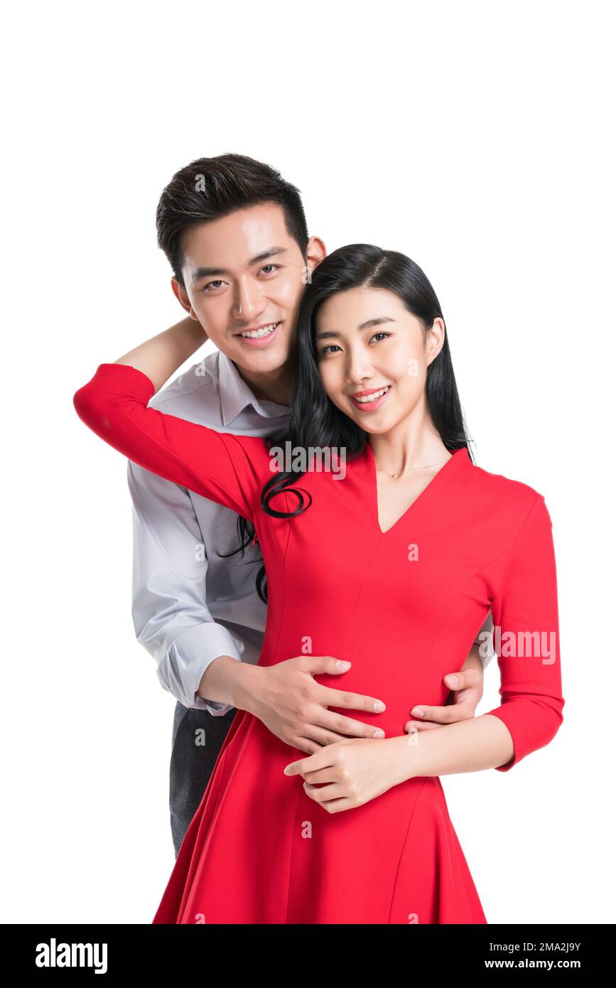 Behing Hug Young lovers behind hug Stock Photo - Alamy