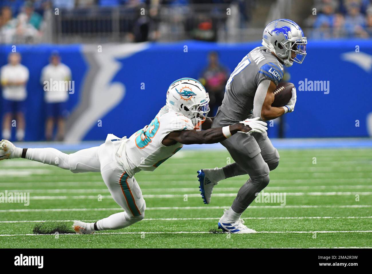 Detroit Lions Wide Receiver Amon-ra St. Brown (14) Tries Pulling Away 