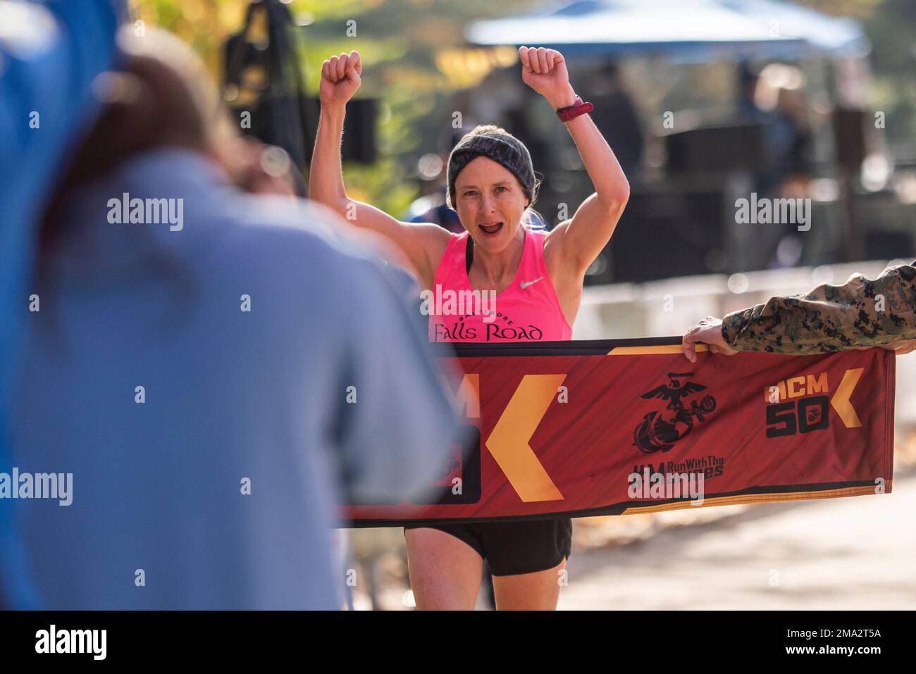 Melissa Tanner crosses the finish line as the first woman to complete ...