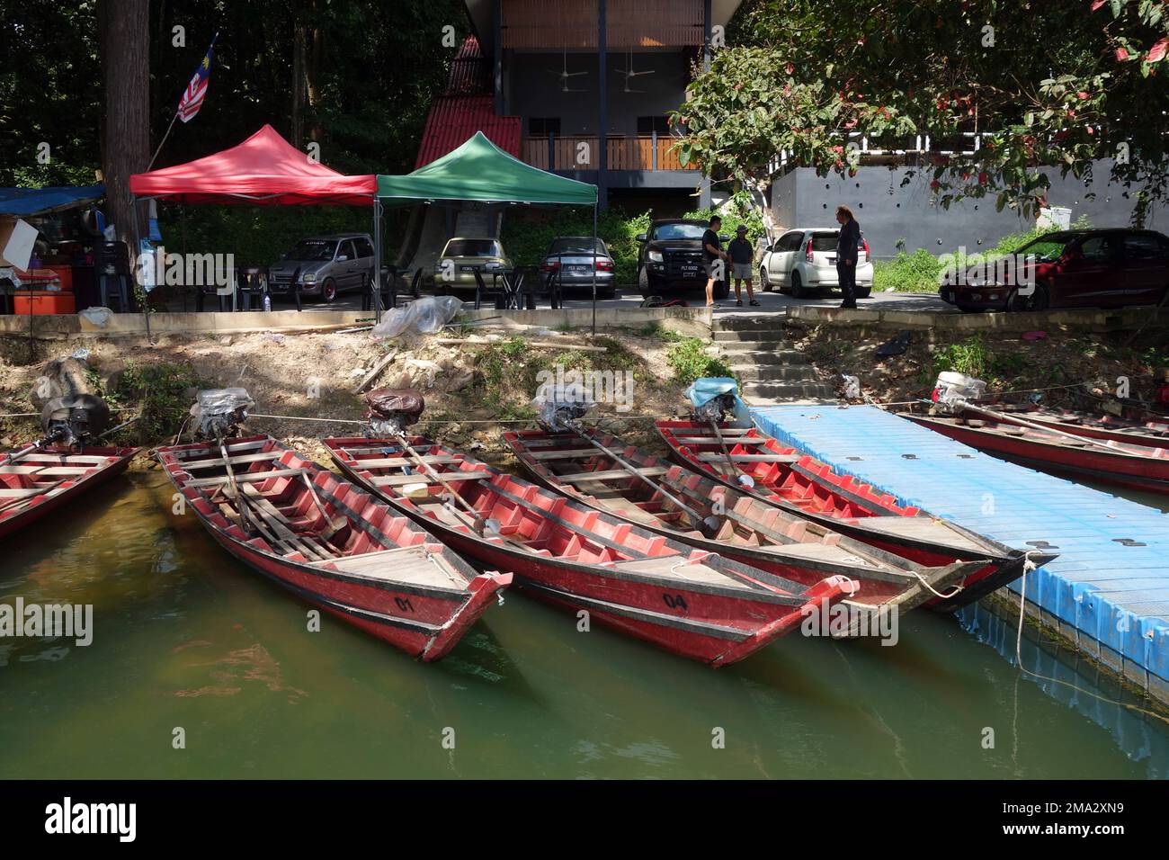 Wooden boats for hire, Ulu Muda, Malaysia. No MR o rPR Stock Photo