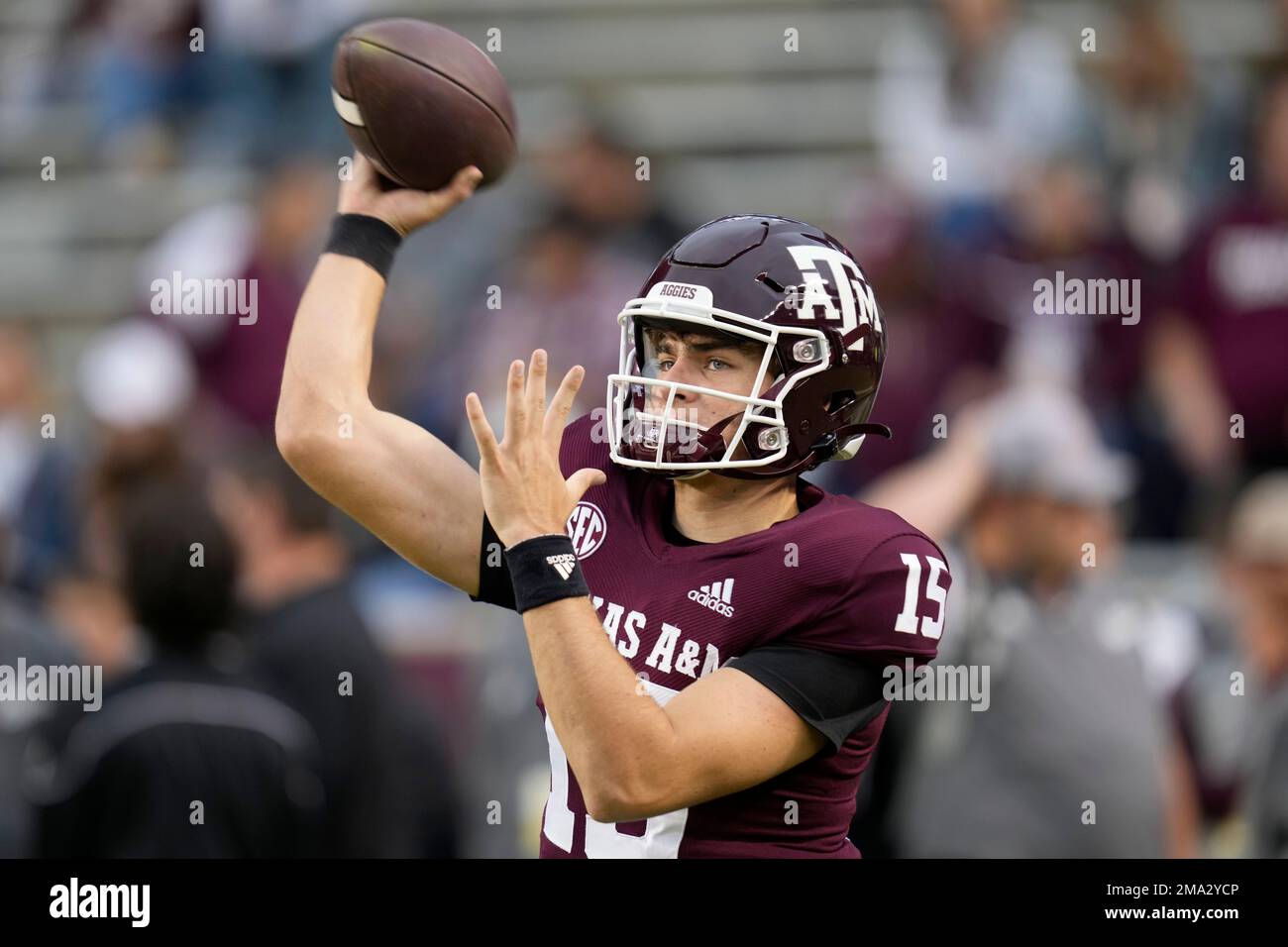 Texas A&M quarterback Conner Weigman (15) throws passes during warmups