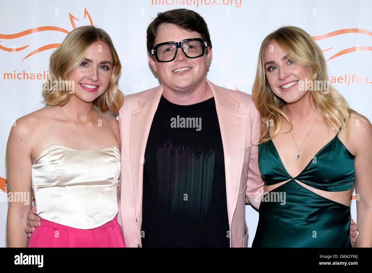 Schuyler Fox, from left, Sam Fox and Aquinnah Fox attend the Michael J