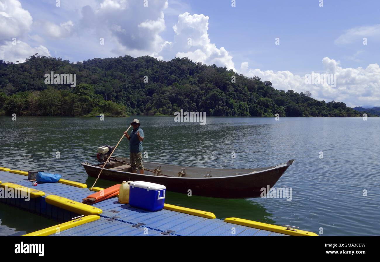 Boatman ready to depart to the jungles of Ulu Muda, Malaysia. No MR or PR Stock Photo
