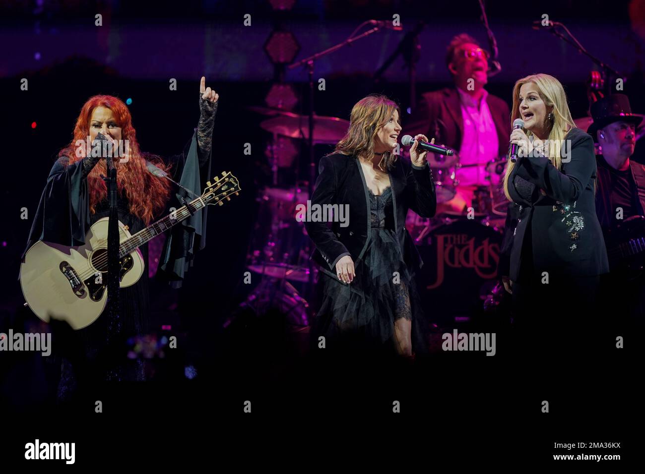 Wynonna Judd, left, performs with Martina McBride and Trisha Yearwood