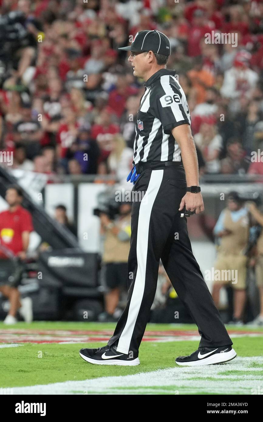 Back judge Matt Edwards (96) watches the action during an NFL football game  between the Baltimore Ravens and the Tampa Bay Buccaneers , Thursday, Oct.  27, 2022 in Tampa, Fla. The Ravens