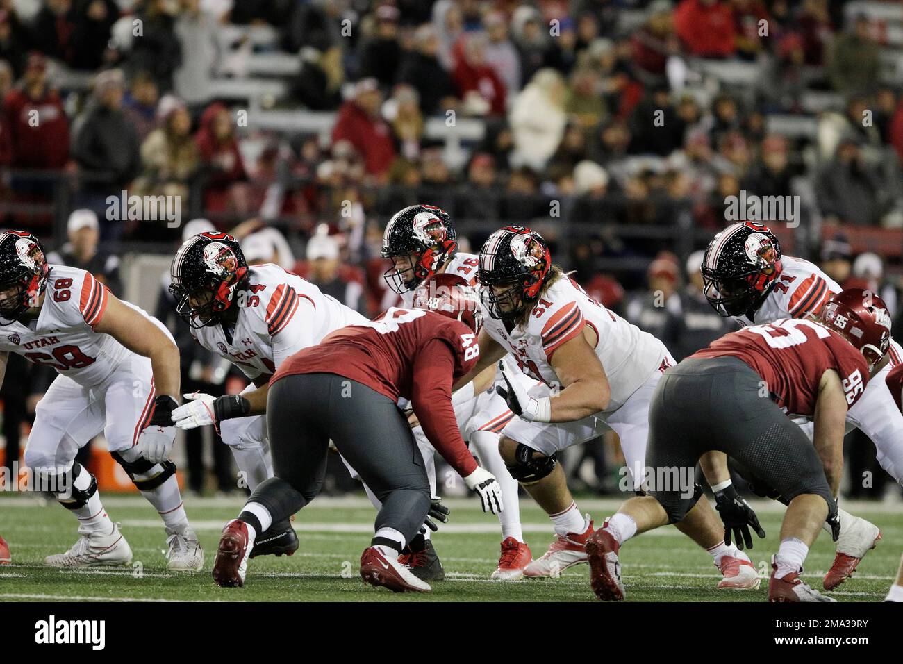 Utah offensive linemen Jaren Kump (68), Paul Maile (54), Keaton Bills