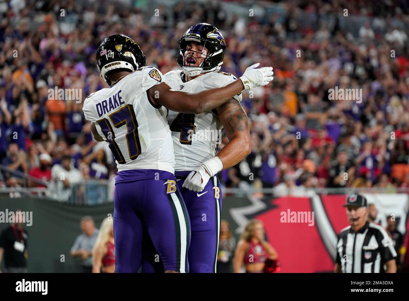 Baltimore Ravens running back Kenyan Drake (17) is congratulated by ...