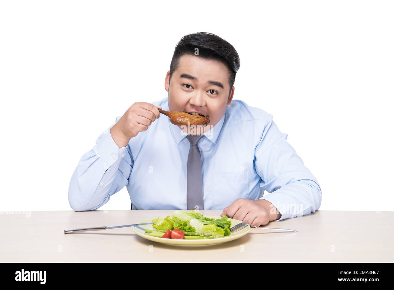 Fat people at dinner Stock Photo