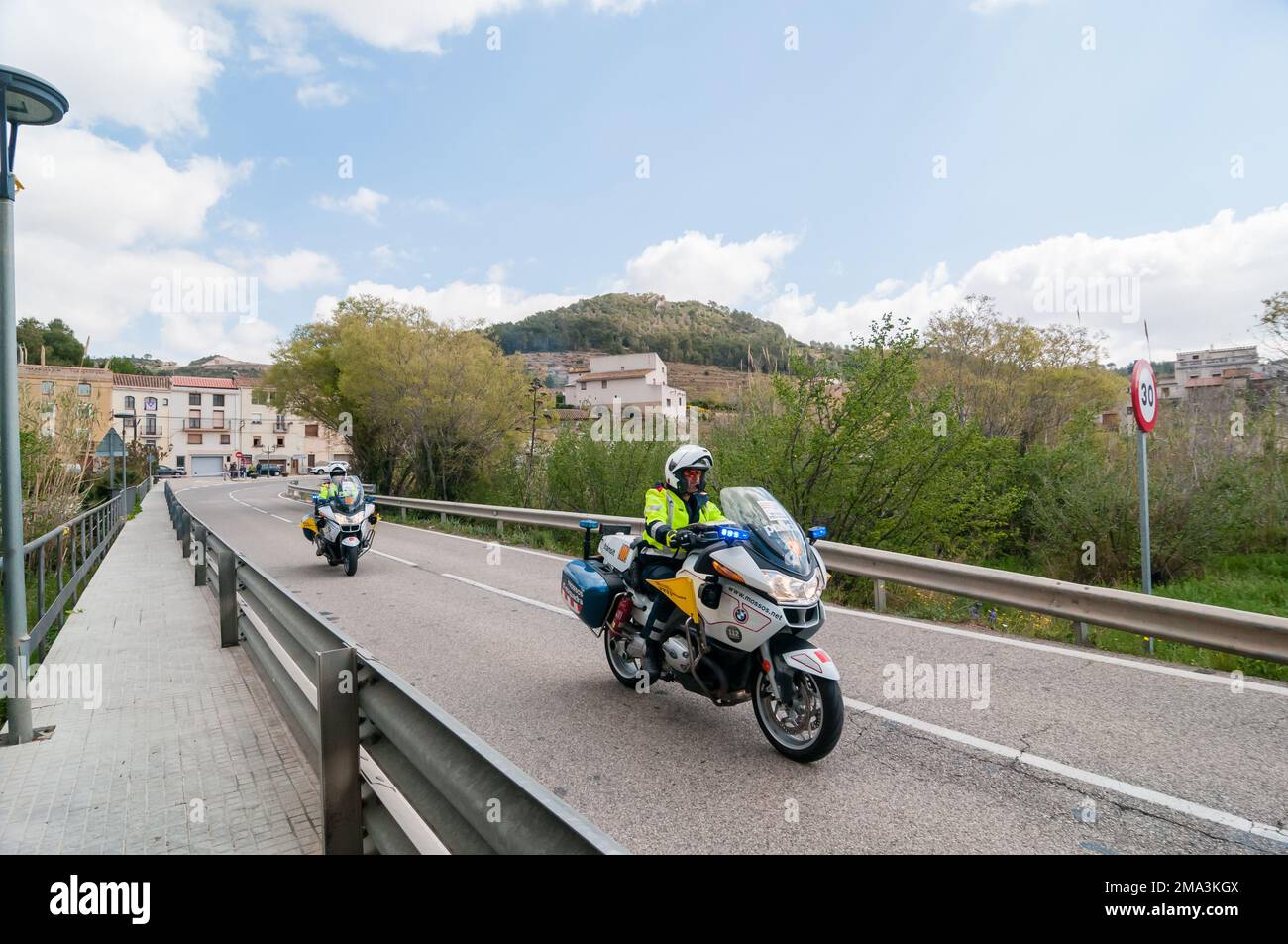 Mossos d'esquadra, Catalan police motorbikes, supporting a cycling race, Volta Catalunya 2019. Volta Road Cycling in Catalonia. Picamoixons, Tarragona Stock Photo