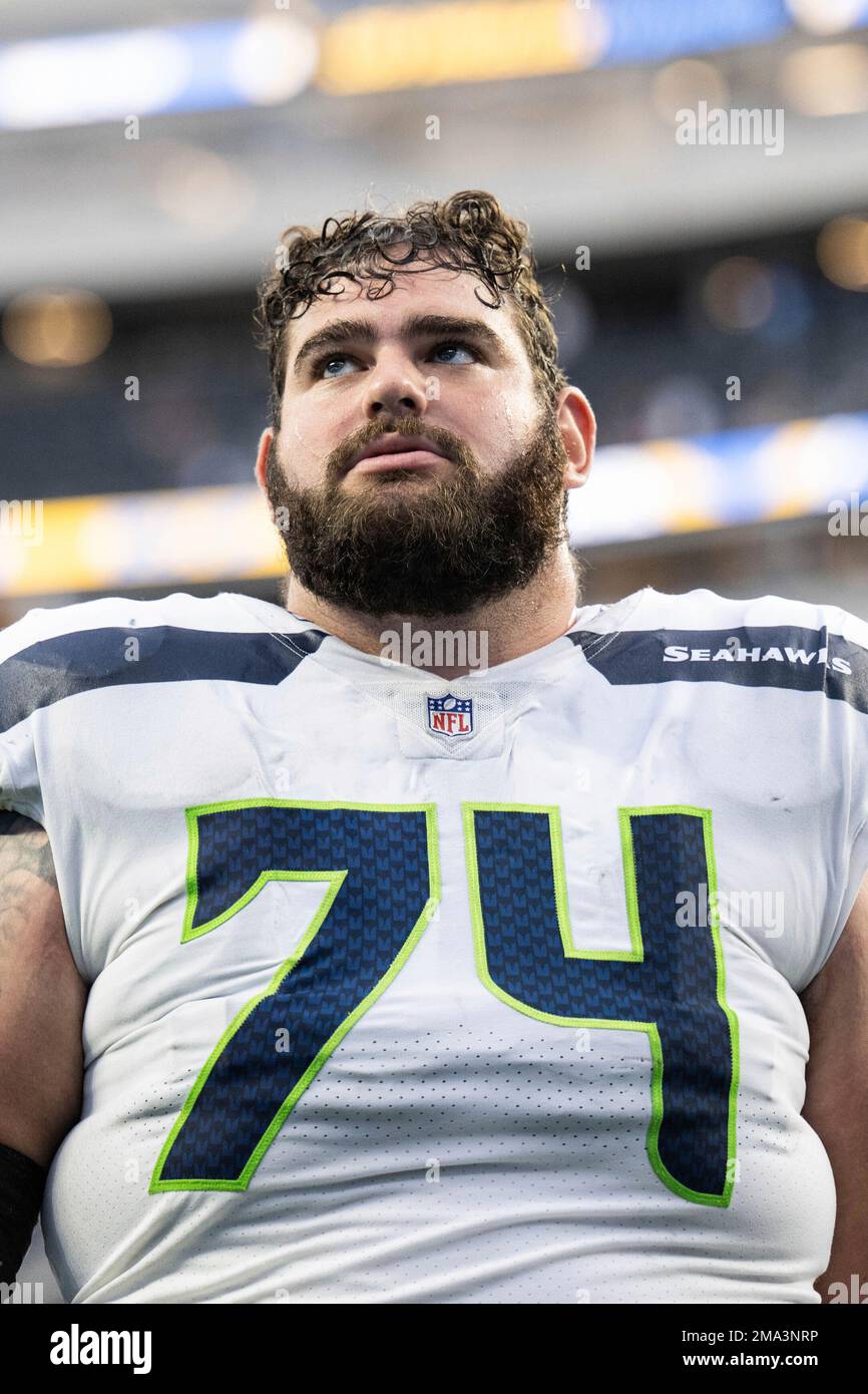 Seattle Seahawks offensive tackle Jake Curhan (74) walks back to the locker  room after an NFL