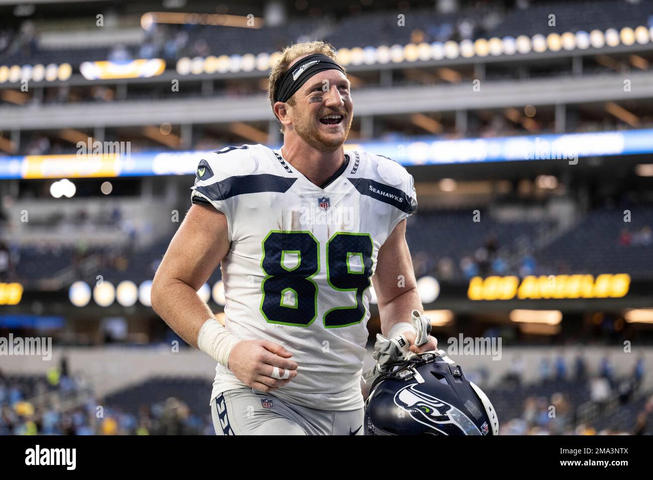 Seattle Seahawks tight end Will Dissly (89) jogs back to the locker room  after an NFL