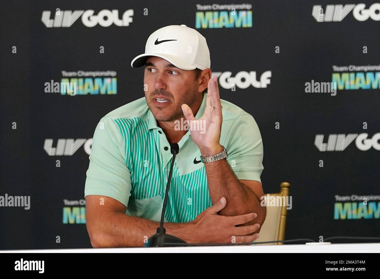 Brooks Koepka speaks during a news conference for the LIV Golf Team Championship at Trump National Doral Golf Club, Wednesday, Oct