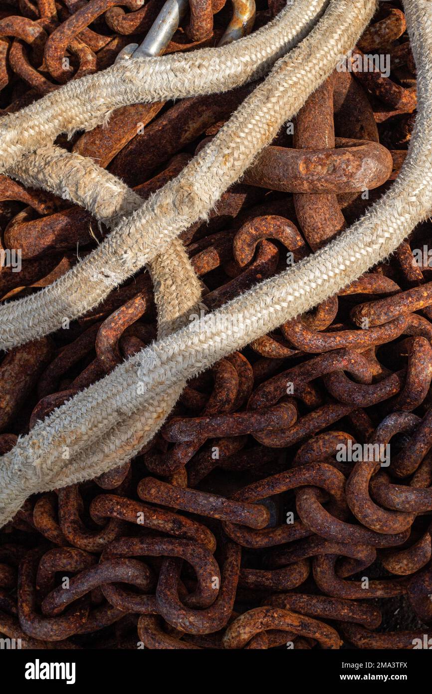 Iron ropes and chains for fishing on the ground of the small fishing ...