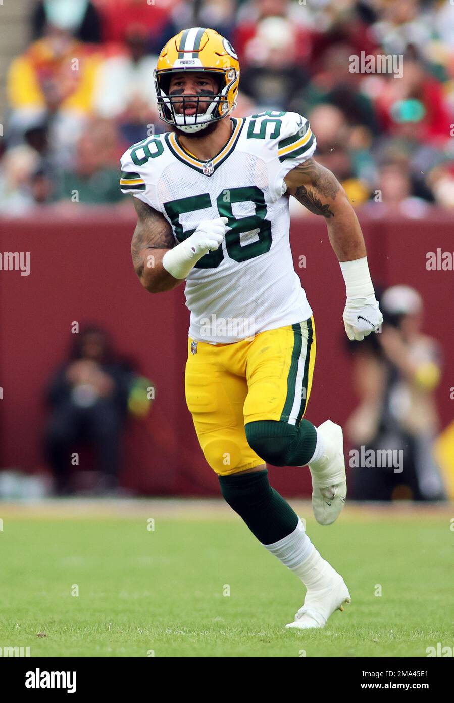 Green Bay Packers linebacker Isaiah McDuffie (58) runs during an