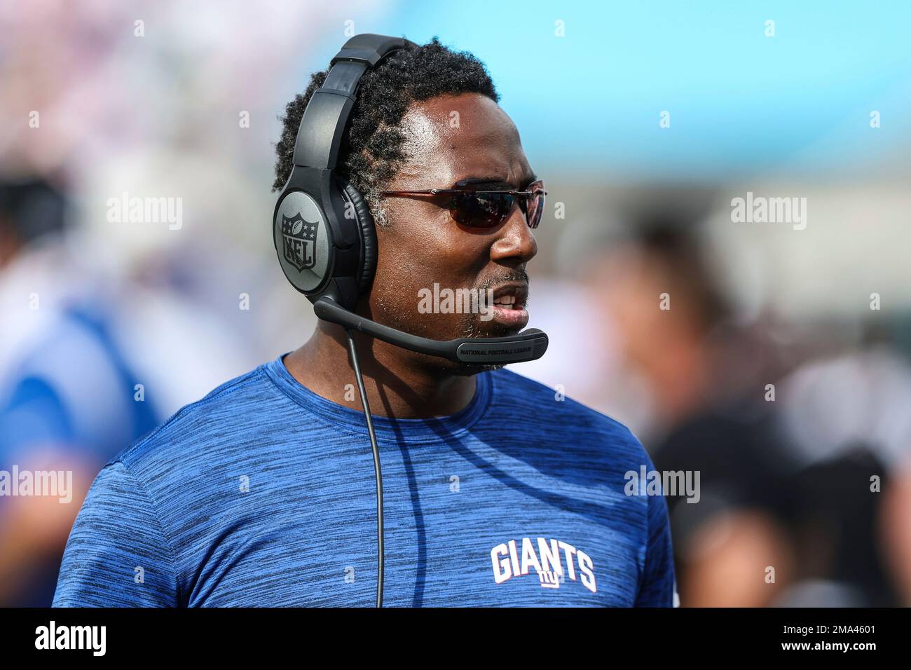New York Giants assistant special teams coach Anthony Blevins walking