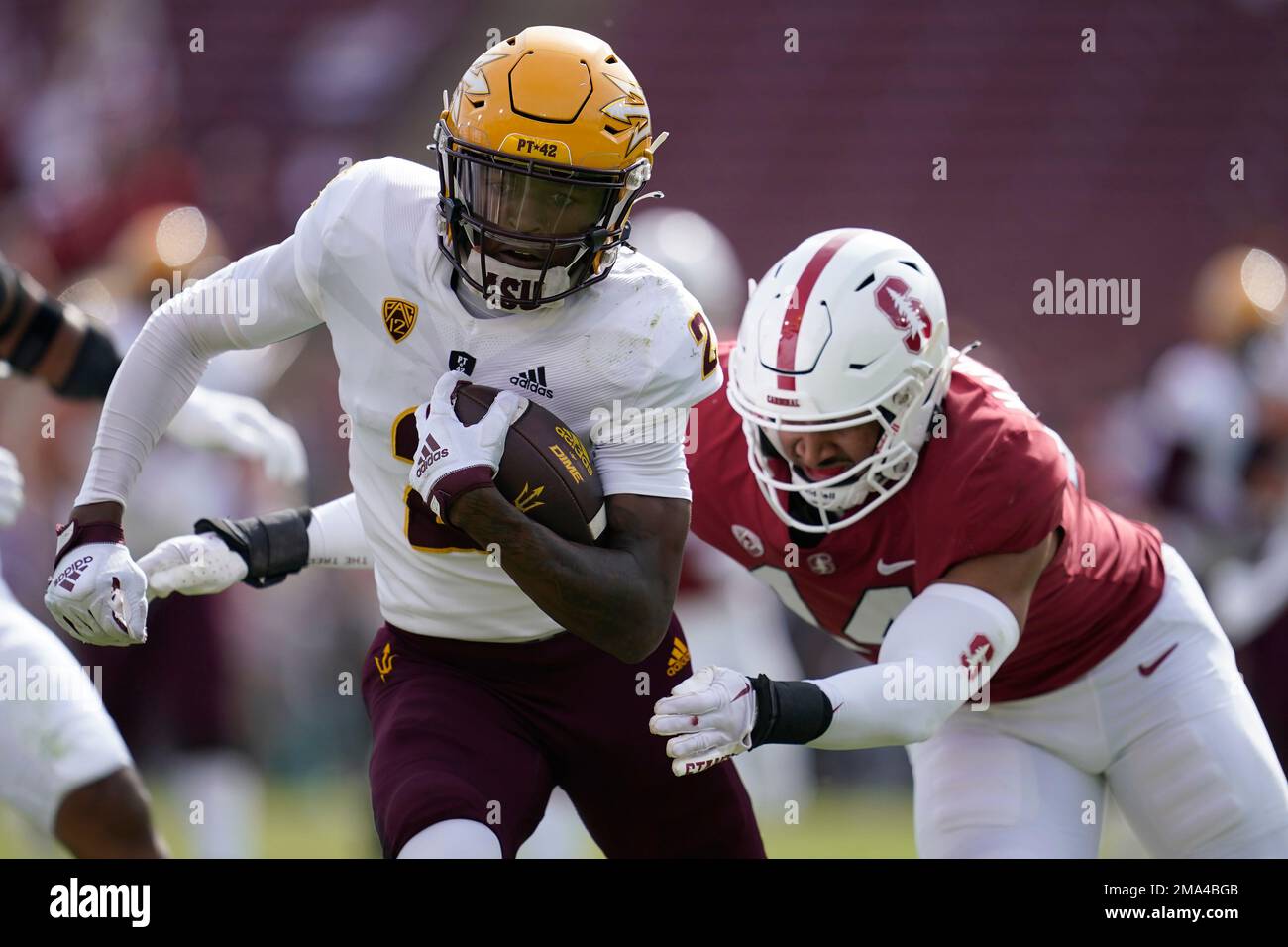 Arizona State wide receiver Elijhah Badger, left, runs against Stanford