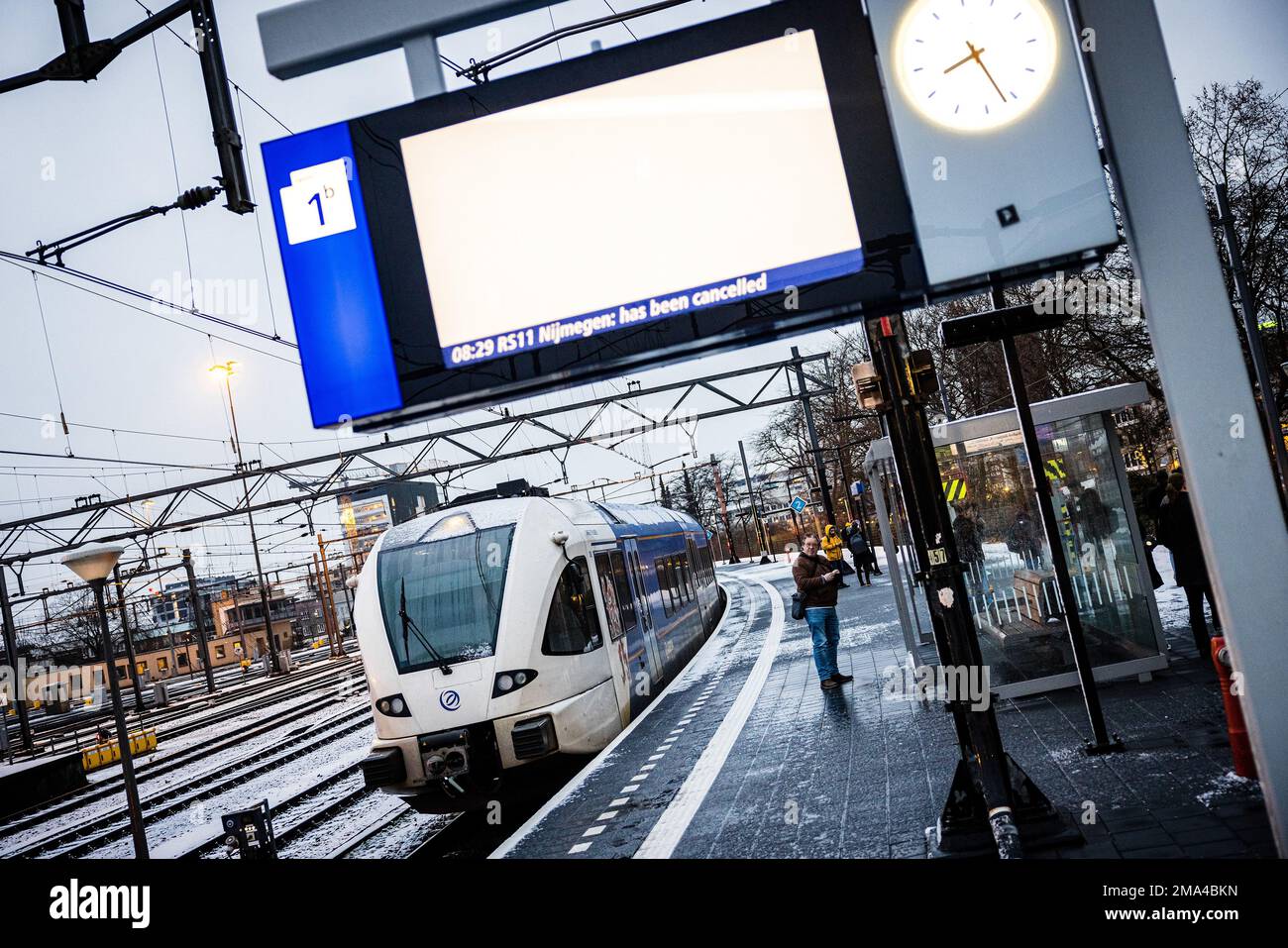 VENLO - Passengers at Venlo station wait in vain for the train. Thousands of bus drivers, train drivers and conductors in regional transport stopped working after failed collective bargaining. ANP ROB ENGELAAR netherlands out - belgium out Stock Photo
