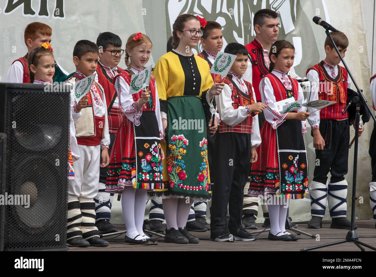 Bulgarian children perform a song in celebration of Culture and Literacy Day in Nessebar, Bulgaria, May 24, 2022. U.S. Army Soldiers, assigned to Civil Affairs Team 0733, 407th Civil Affairs Battalion, celebrated and attended the festivities in order to demonstrate the U.S. commitment to strengthen ties with Bulgaria, a steadfast and gracious host to U.S. Army Soldiers, and to continue our long-term relationship with this strategic ally. The Day of Bulgarian Alphabet, Bulgarian Enlightenment and Culture has been celebrated in Bulgaria since May 11, 1851, to honor the creators of the Cyrillic a Stock Photo