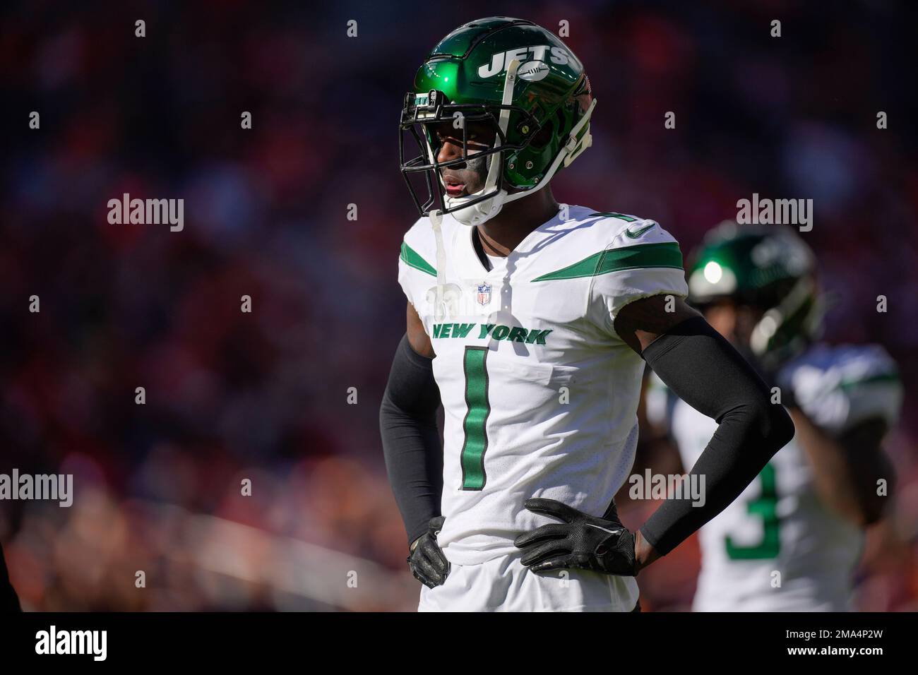 New York Jets cornerback Sauce Gardner (1) works against the Denver