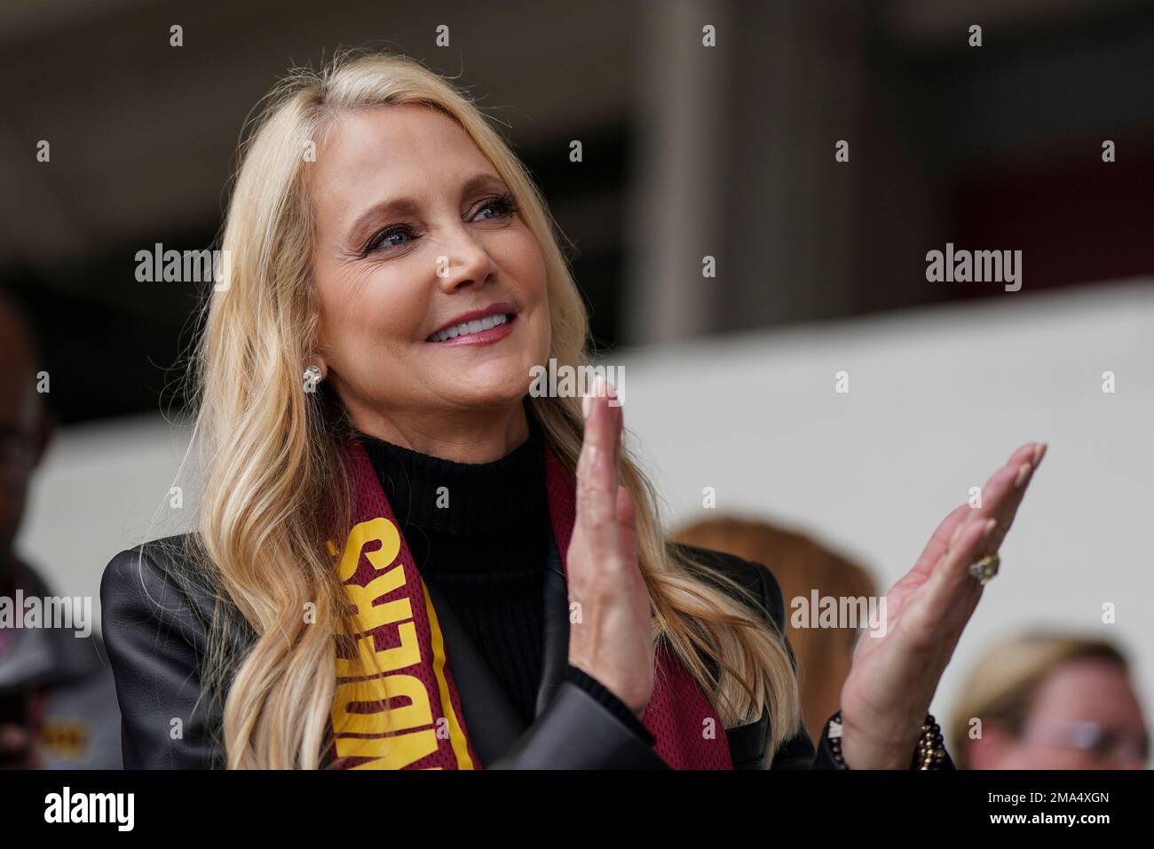 Tanya Snyder, Washington Commanders co-owner, applauds before an NFL  football game between the Washington Commanders and the Green Bay Packers,  Sunday, Oct. 23, 2022, in Landover, Md. (AP Photo/Al Drago Stock Photo 