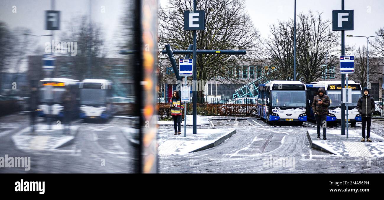VENLO - Passengers at the Venlo bus station wait in vain for the bus. Thousands of bus drivers, train drivers and conductors in regional transport stopped working after failed collective bargaining. ANP ROB ENGELAAR netherlands out - belgium out Stock Photo