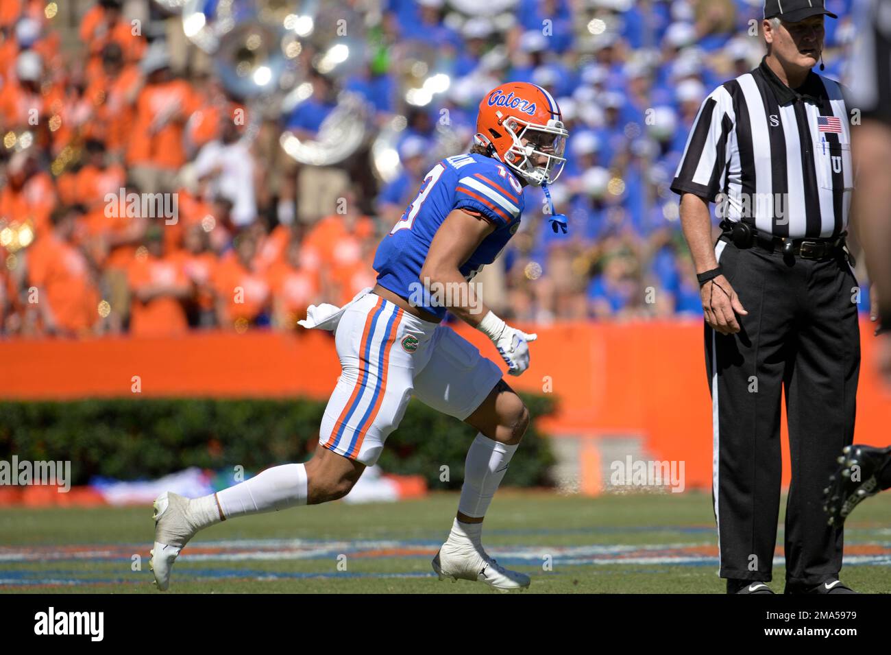 Florida safety Donovan McMillon (13) defends against Eastern Washington  wide receiver Efton Chism III (89) during the second half of an NCAA  college football game, Sunday, Oct. 2, 2022, in Gainesville, Fla. (