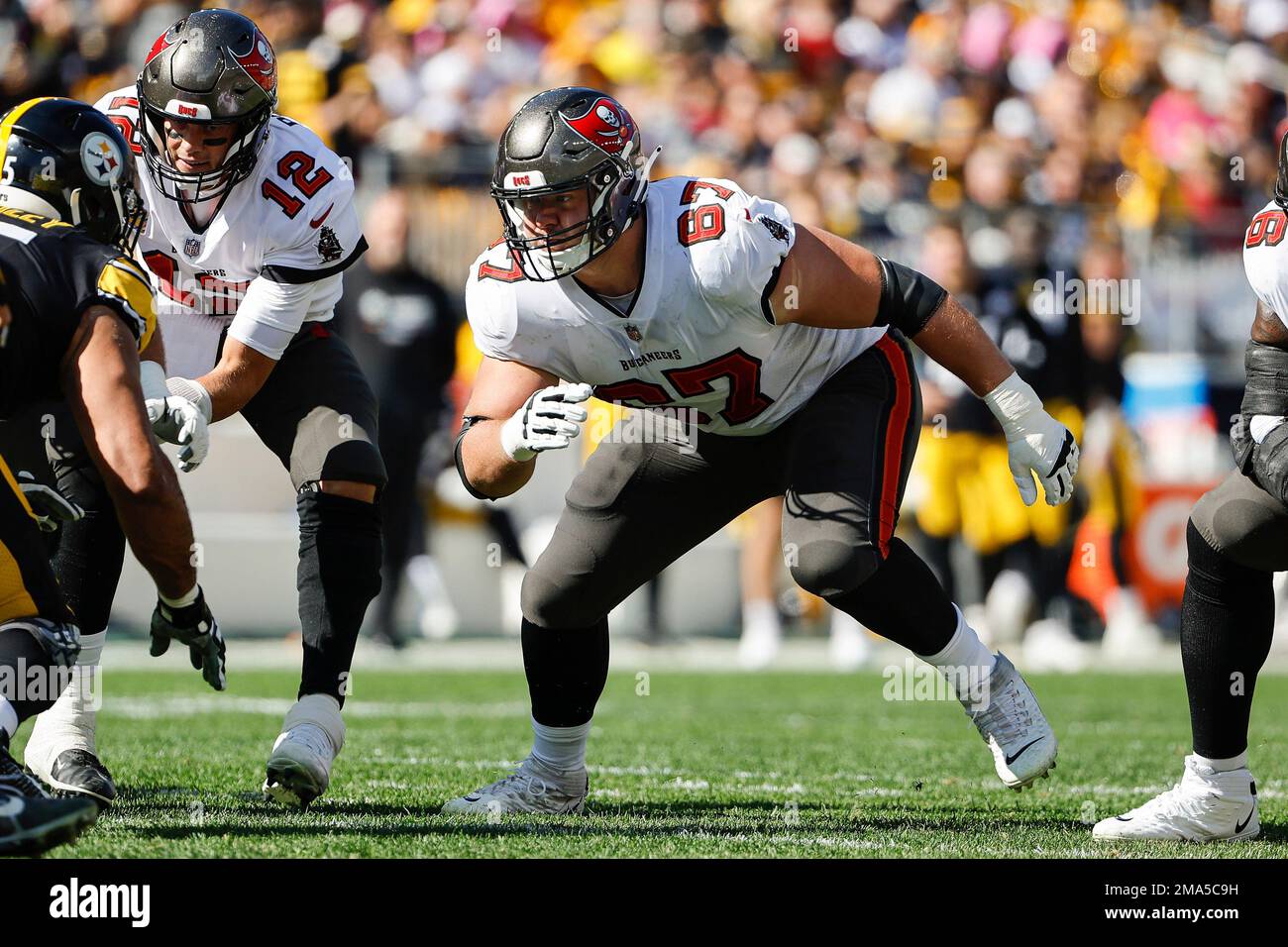 Tampa Bay Buccaneers' Luke Goedeke looks to block against the ...