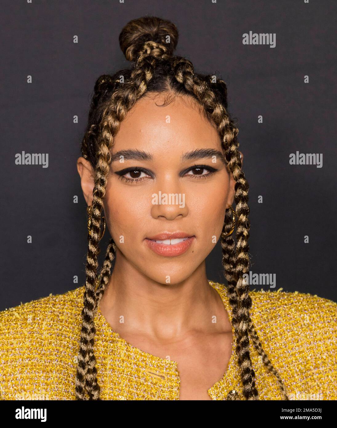 Lori Harvey arrives at the Chanel dinner to celebrate the 1932