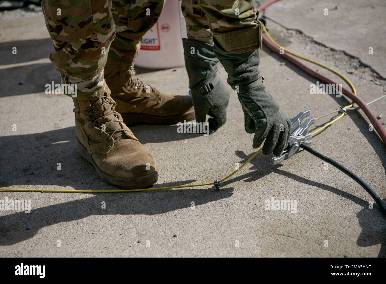 Members of the Michigan National Guard perform a fuel line flushing and