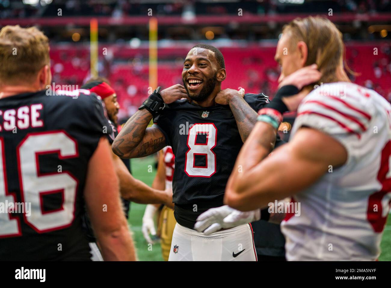 Atlanta Falcons tight end Kyle Pitts (8) participates in a jersey swap  after an NFL football game against the San Francisco 49ers, Sunday, Oct.  16, 2022, in Atlanta. The Atlanta Falcons won