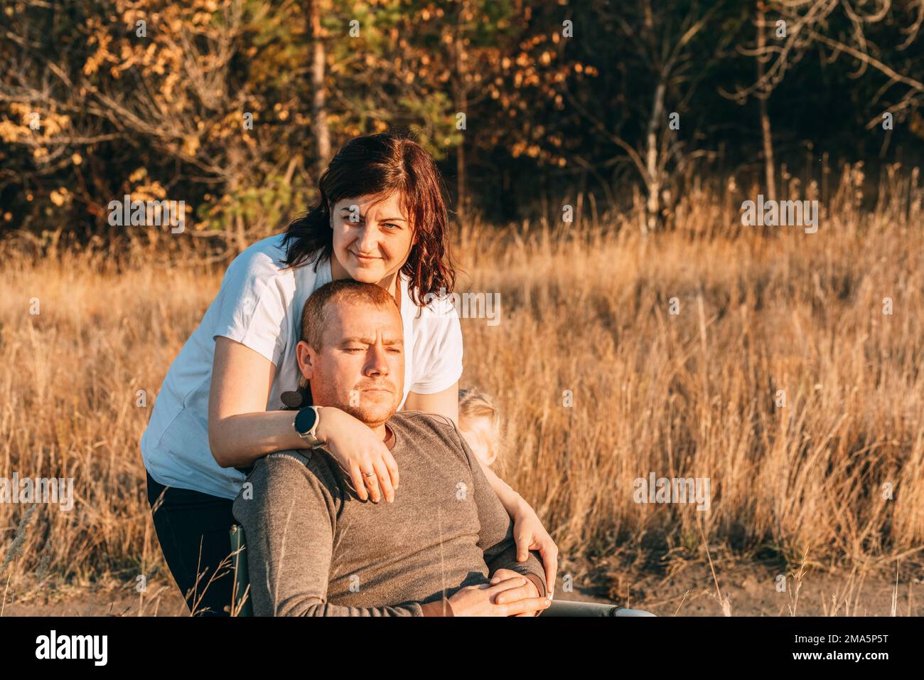 Loving Caucasian Couple In Countryside. Gentle hugs, a concept for Valentine's Day Stock Photo