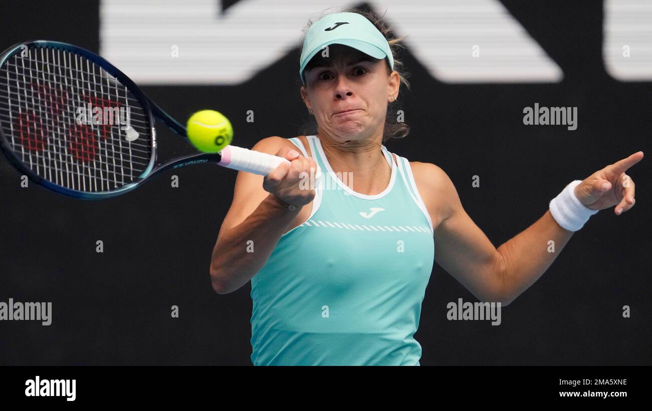 Magda Linette of Poland plays a forehand return to Anett Kontaveit of Estonia during their second round match at the Australian Open tennis championship in Melbourne, Australia, Thursday, Jan