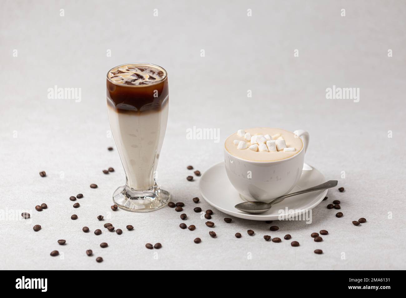 Two drinks cappuccino and iced coffee Stock Photo