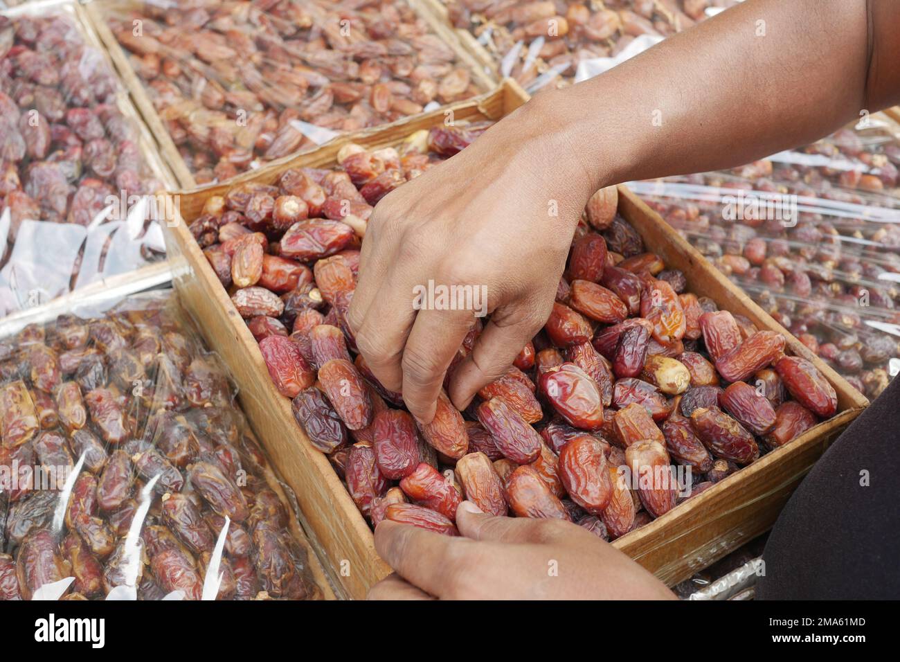 many date fruits display for sale at local market  Stock Photo