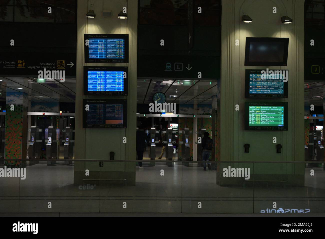 Commuters walk in a Reseau Express Regional (RER) metro station in ...
