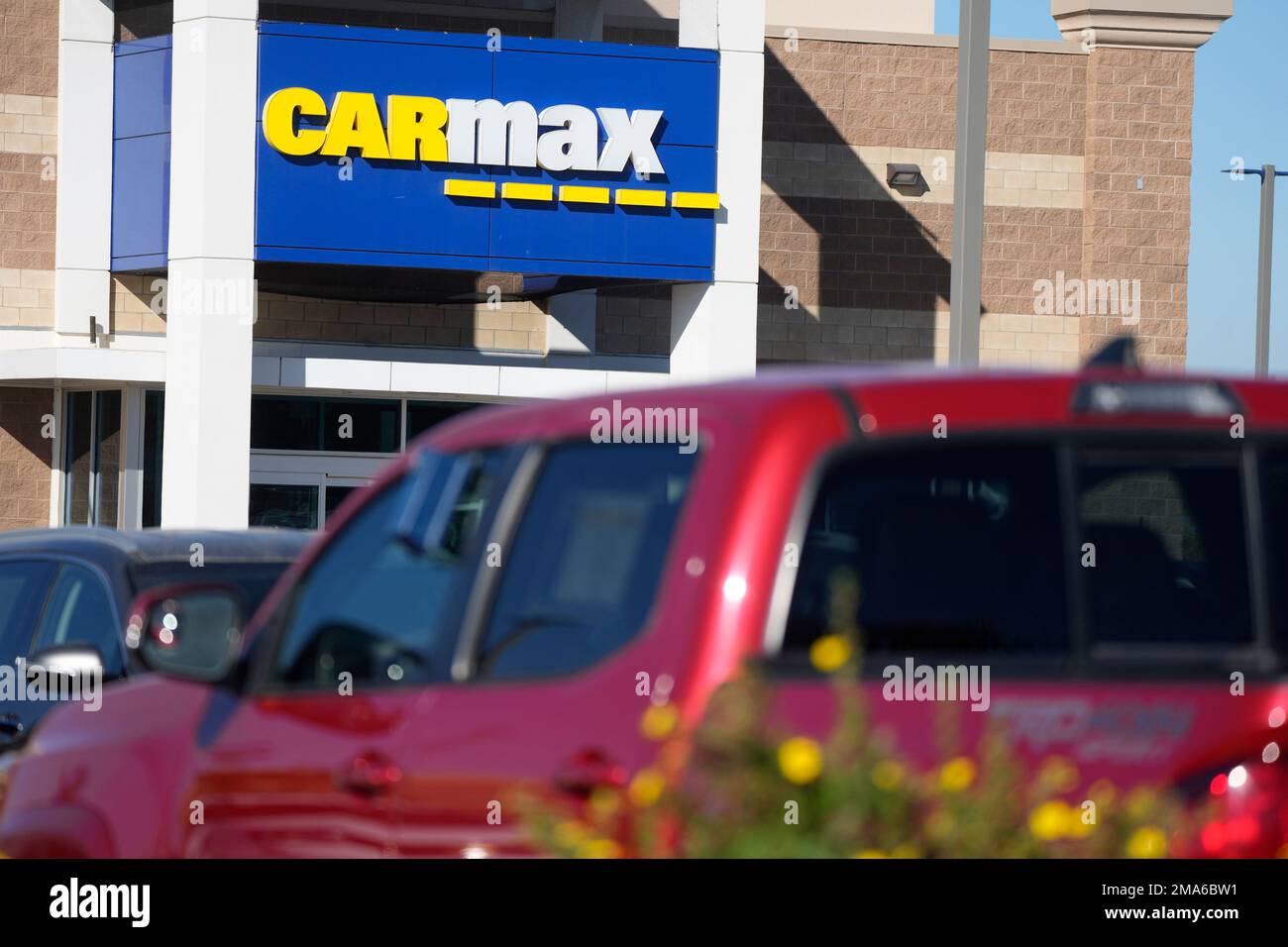 Max Vehicles Sign Sign hangs over the showroom door of a Car Max dealership Monday, Oct ...