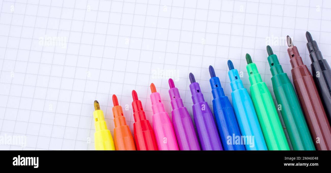 Colorful felt-tip pens on a notebook Stock Photo