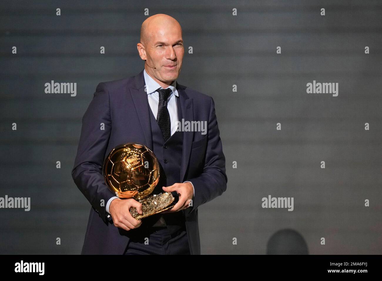 Former soccer player and manager Zinedine Zidane presents the 2022 Ballon d' Or trophy during the 66th Ballon d'Or ceremony at Theatre du Chatelet in  Paris, France, Monday, Oct. 17, 2022. (AP Photo/Francois