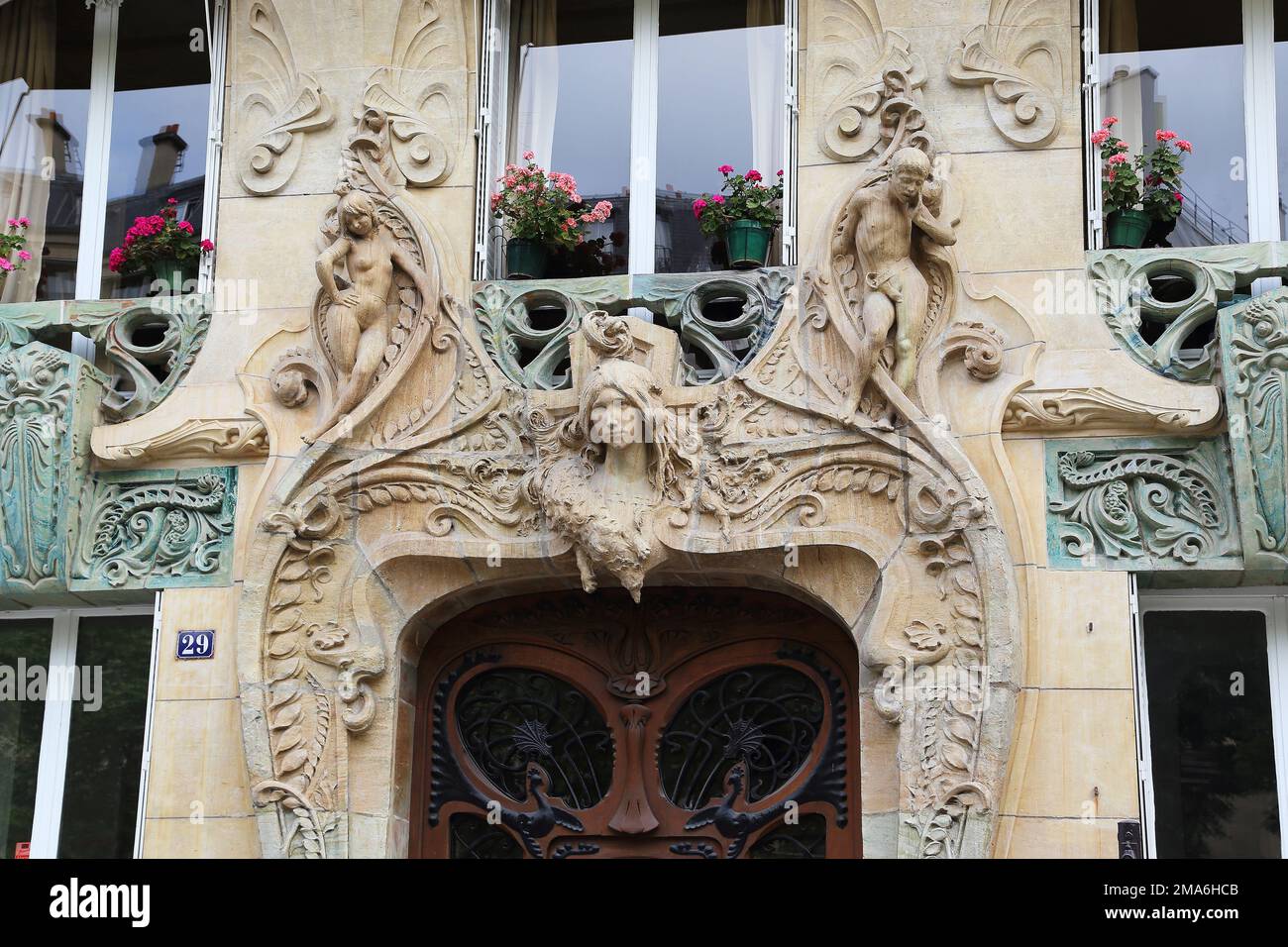 PARIS, FRANCE - MAY 12, 2015: This is a fragment of entrance of an apartment house Lavirotte built in the Art Nouveau style. Stock Photo