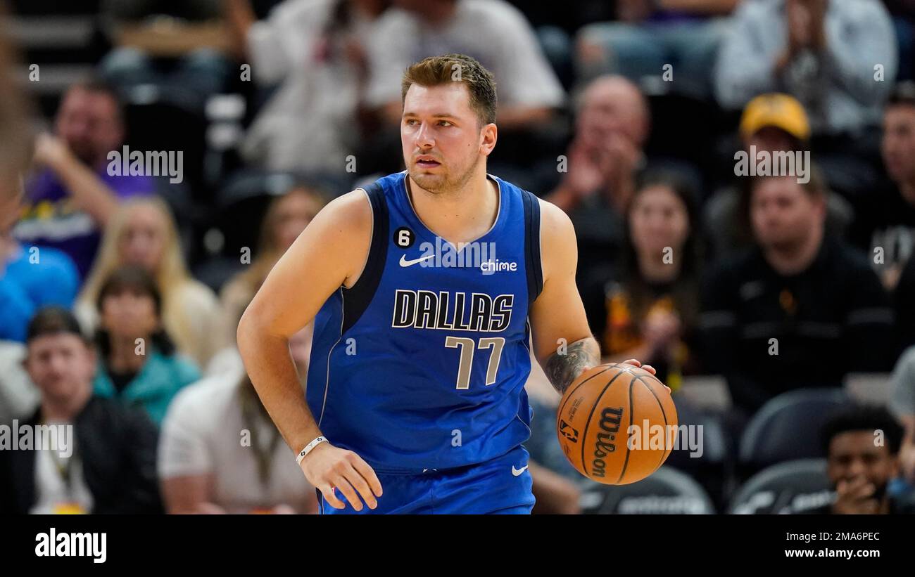 Dallas Mavericks guard Luka Doncic (77) brings the ball up court during ...