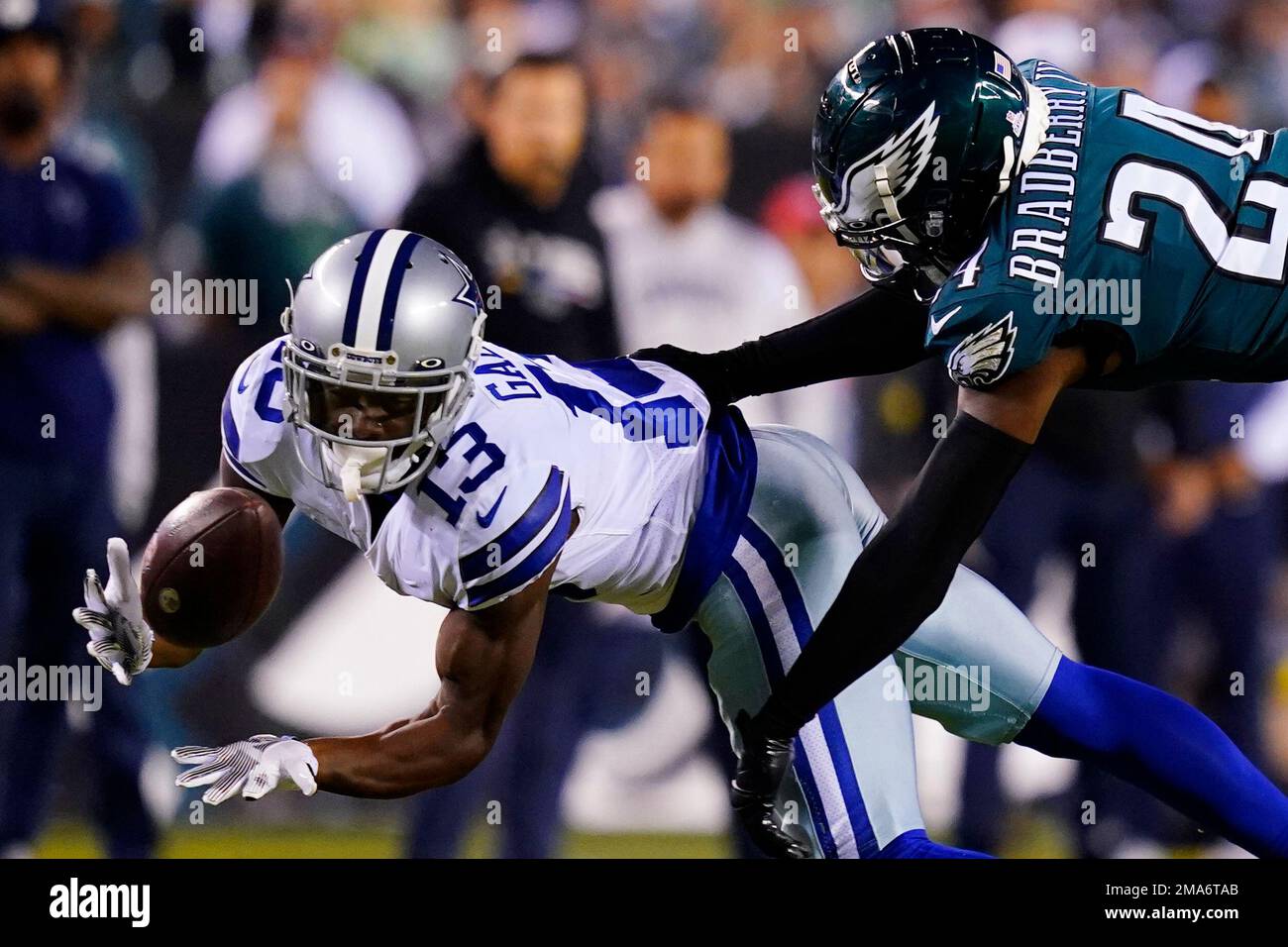 Dallas Cowboys' Michael Gallup catches the ball in front of