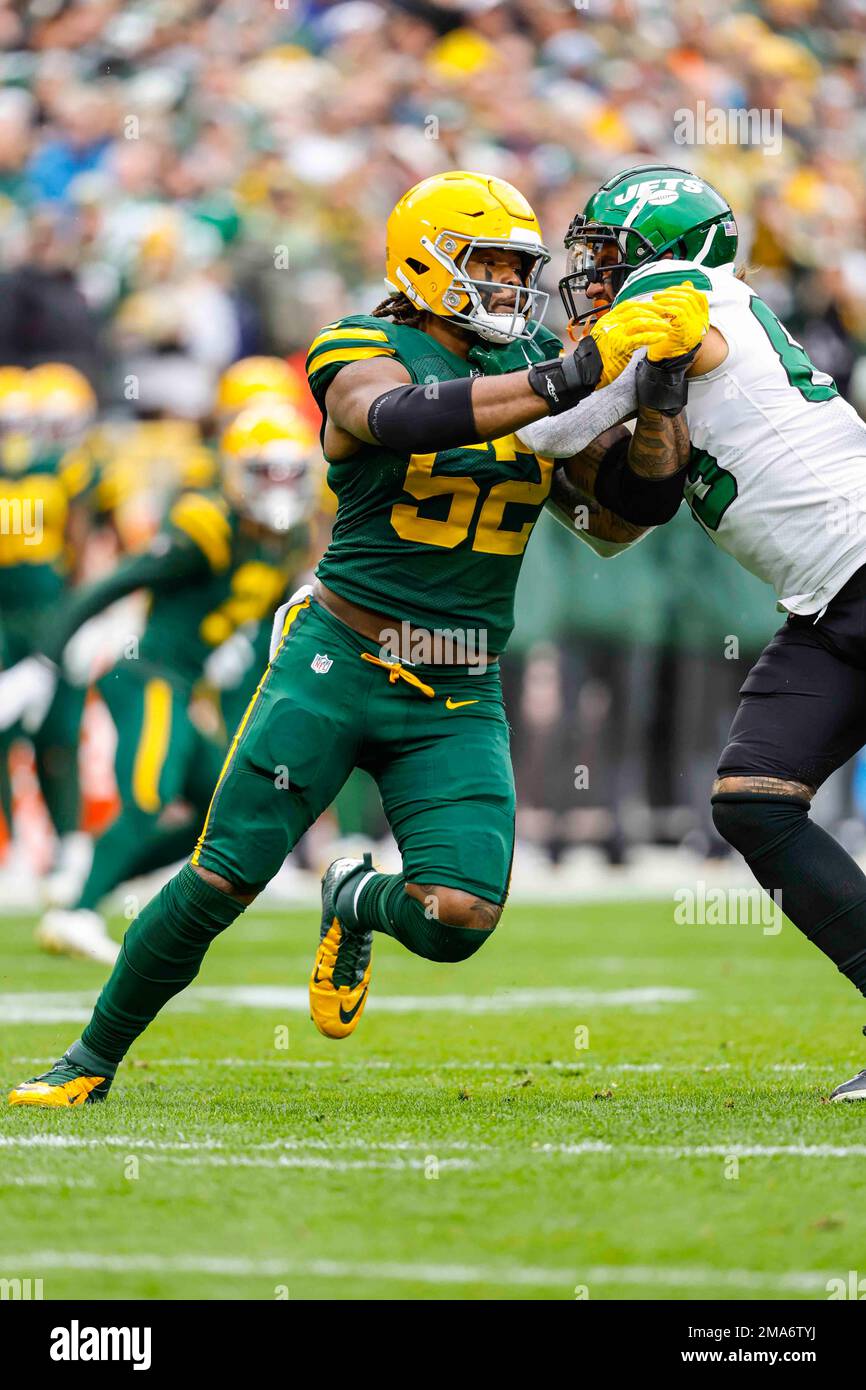 Green Bay Packers linebacker Rashan Gary (52) rushes during an NFL