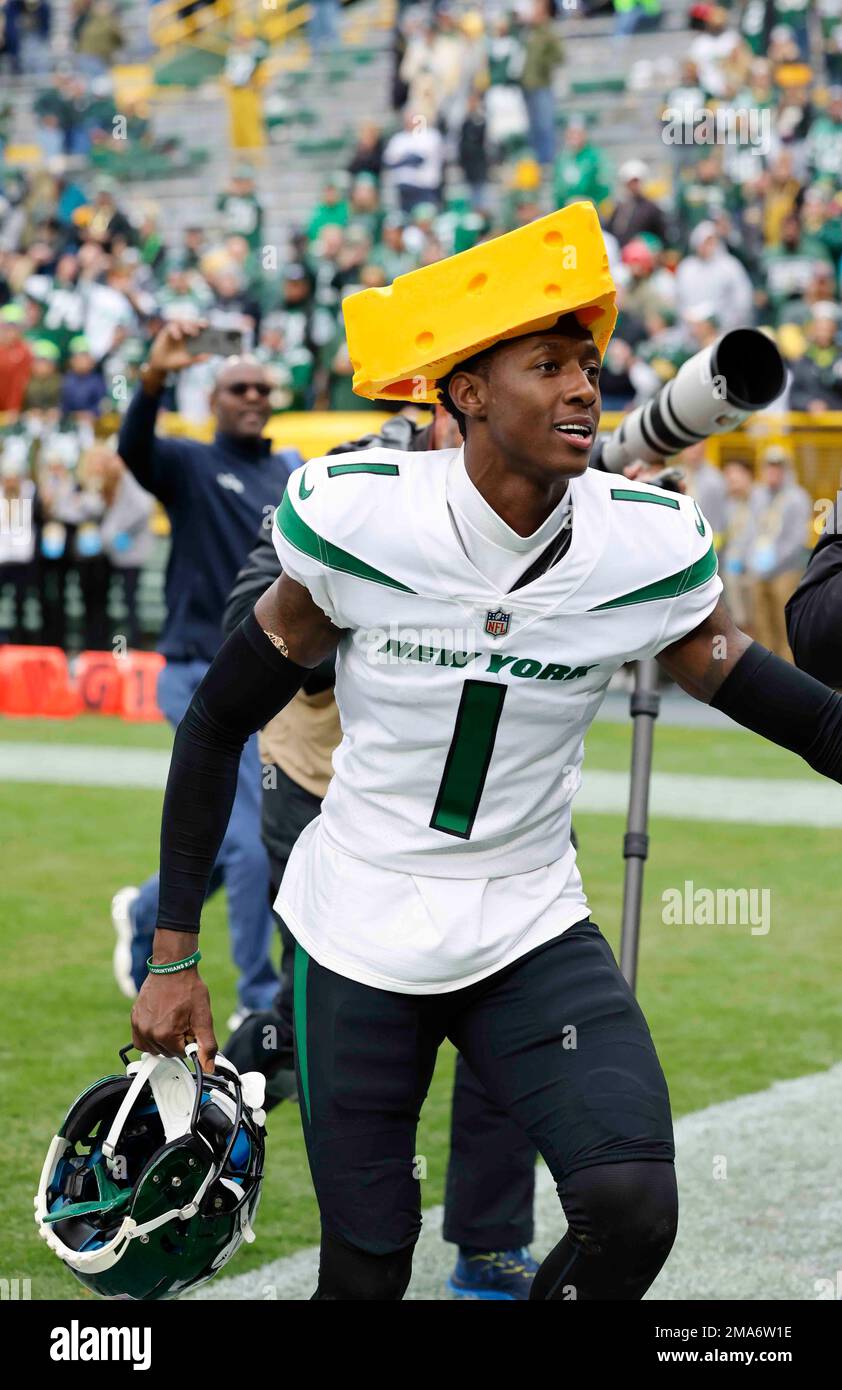 New York Jets cornerback Sauce Gardner (1) walks off the field after