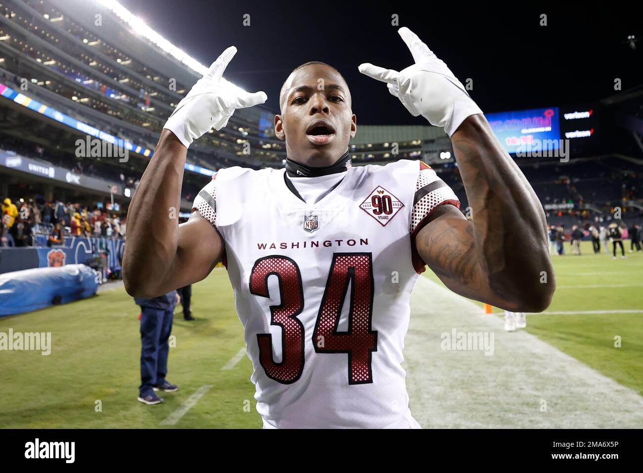 Washington Commanders cornerback Christian Holmes (34) leaves the field  following an NFL football game against the Chicago Bears, Thursday, Oct.  13, 2022, in Chicago. (AP Photo/Kamil Krzaczynski Stock Photo - Alamy