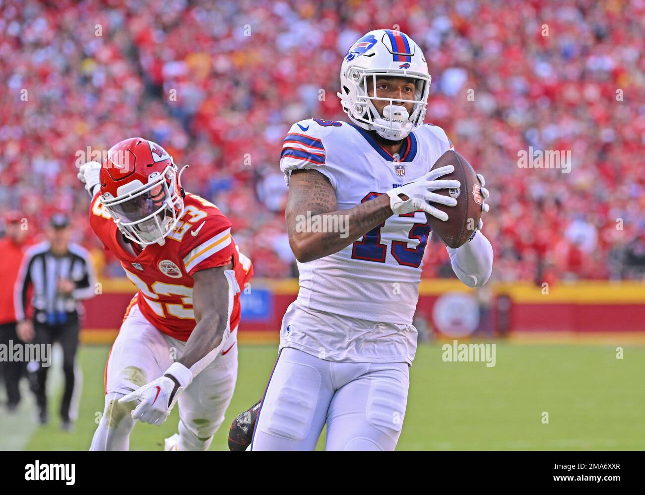 Buffalo Bills wide receiver Gabe Davis (13) catches a touchdown pass during  an NFL football game against Kansas City Chiefs cornerback Joshua Williams  (23) Sunday, Oct. 16, 2022, in Kansas City, Mo. (