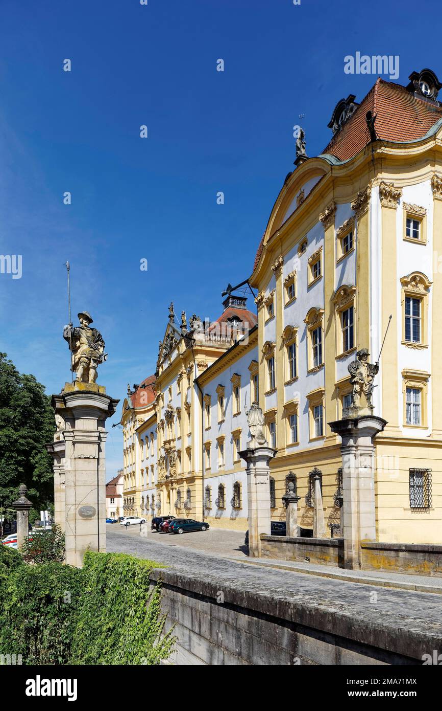 Approach from the east, cobbled street, gateposts with guard figures, Ellingen Residence, built 1708-1760, High Baroque, castle, Teutonic Order Stock Photo