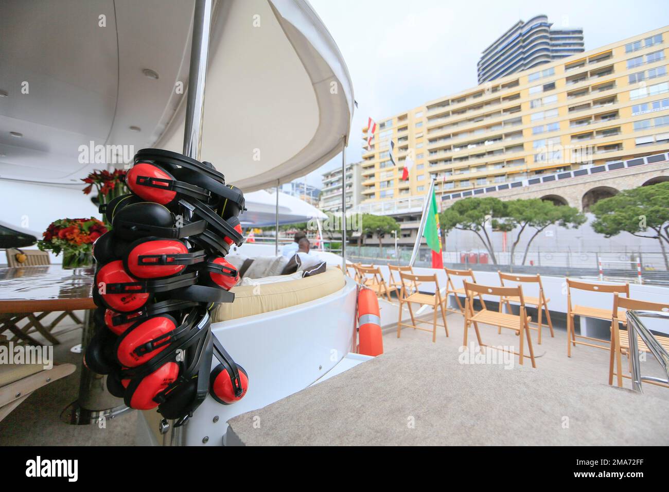 Chairs set up for the spectators on the quarterdeck of a motor yacht at