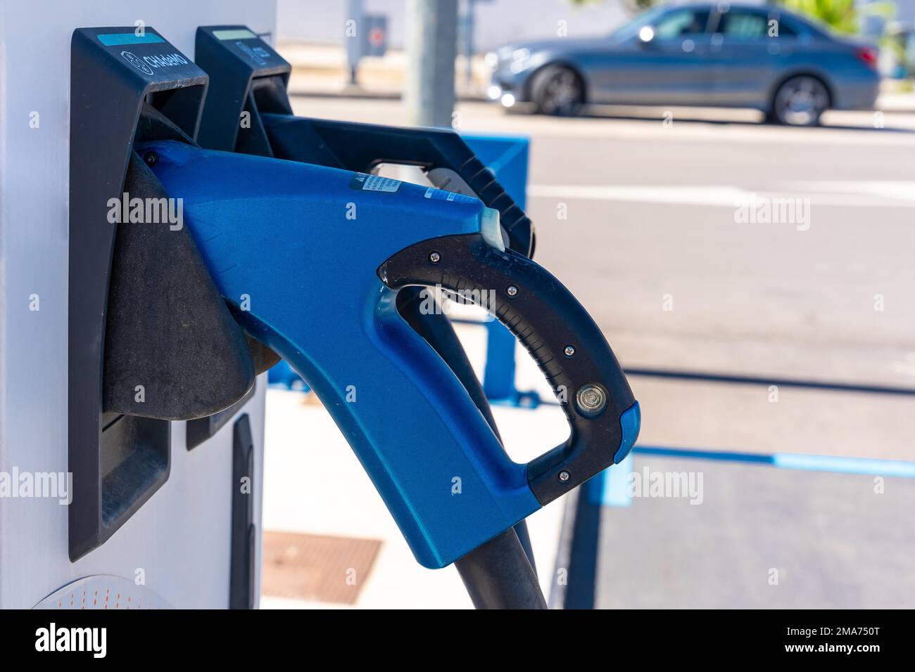 Electric car charger at a gas station. ecological mobility Stock Photo