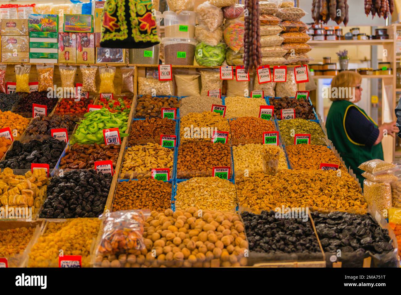 Kaliningrad Central Market, stalls, food, nuts, dried fruit, tropical fruit, scales, vendor, Kaliningrad, Kaliningrad Oblast, Russia Stock Photo